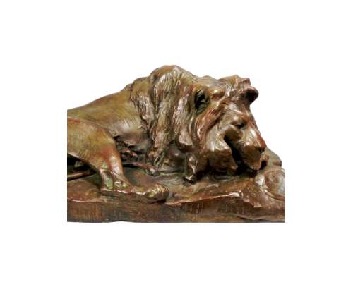 Sculpture en bronze lion couché Josuë Dupon vue de face